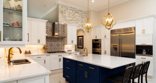 Beautiful luxury estate home kitchen with white cabinets.